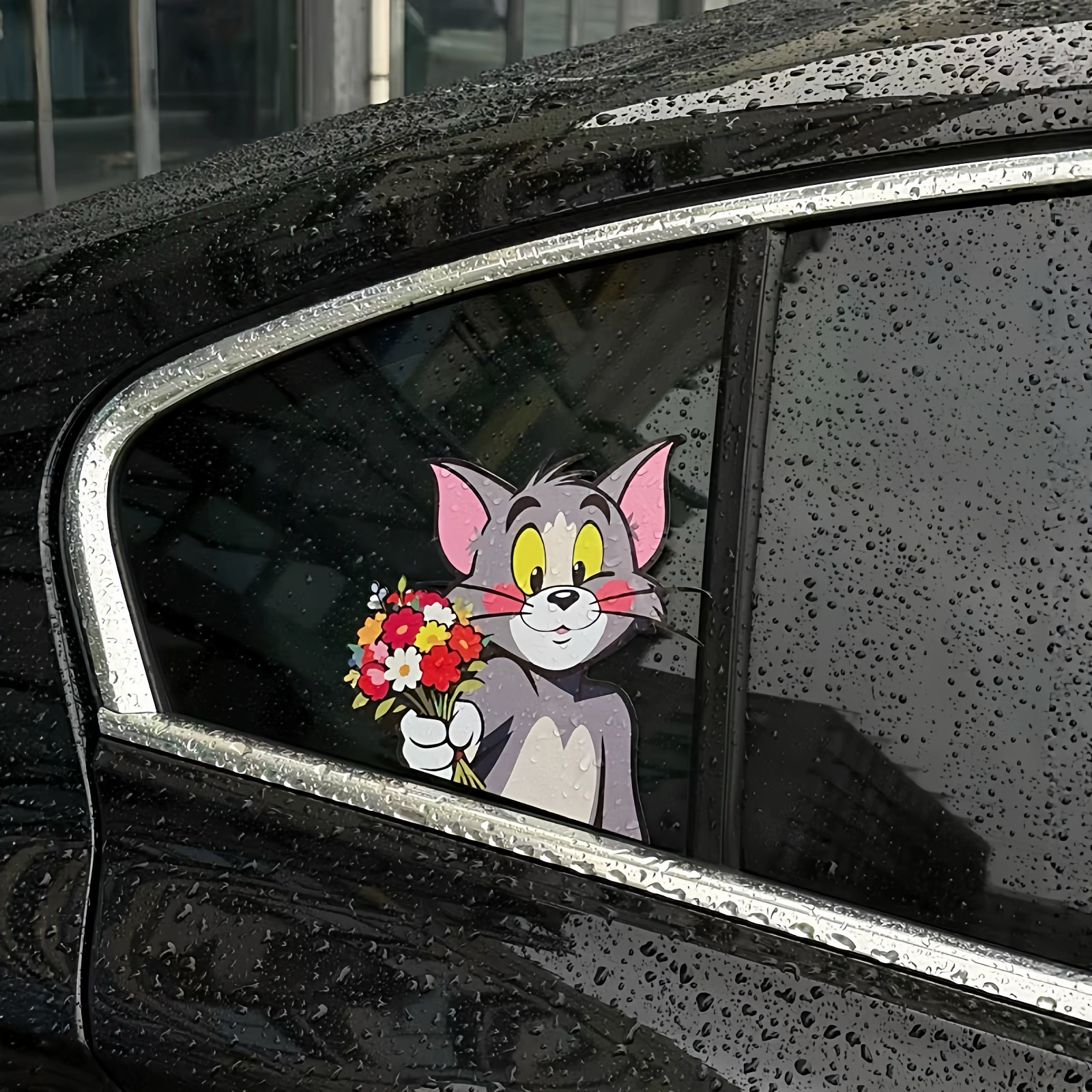Creative Tom and Jerry peeking car stickers on dark tinted glass with a realistic 3D effect.