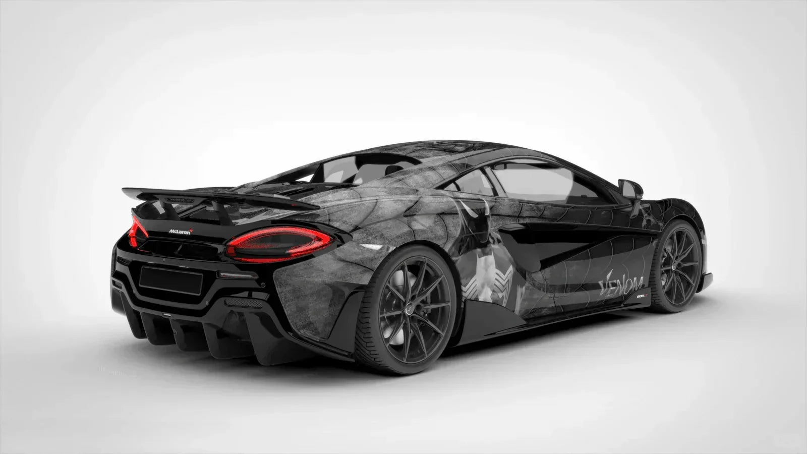 Black sports car with a unique design on a white background