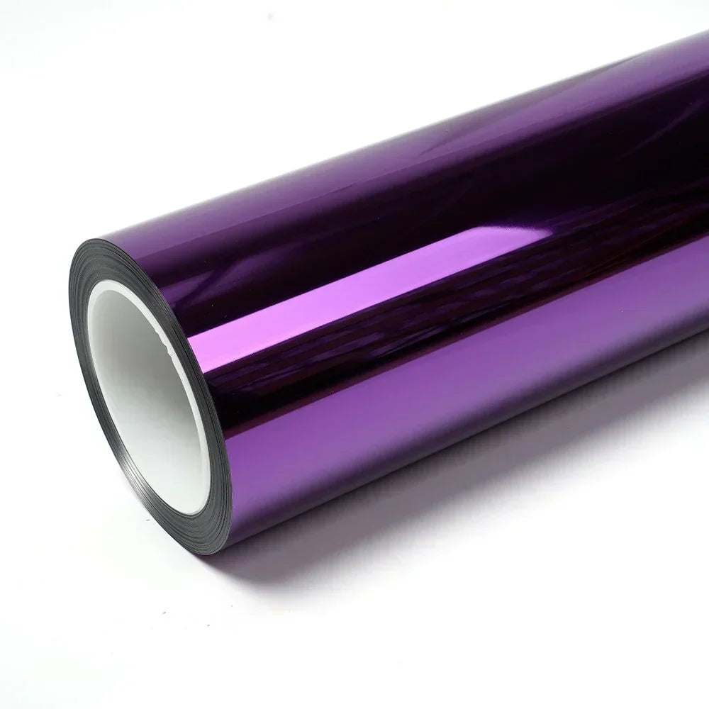 Roll of purple vinyl wrap on a white background